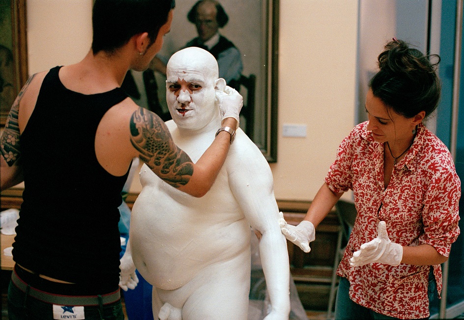 Franko B preparing for performance in Cork - photographer Hugo Glendinning